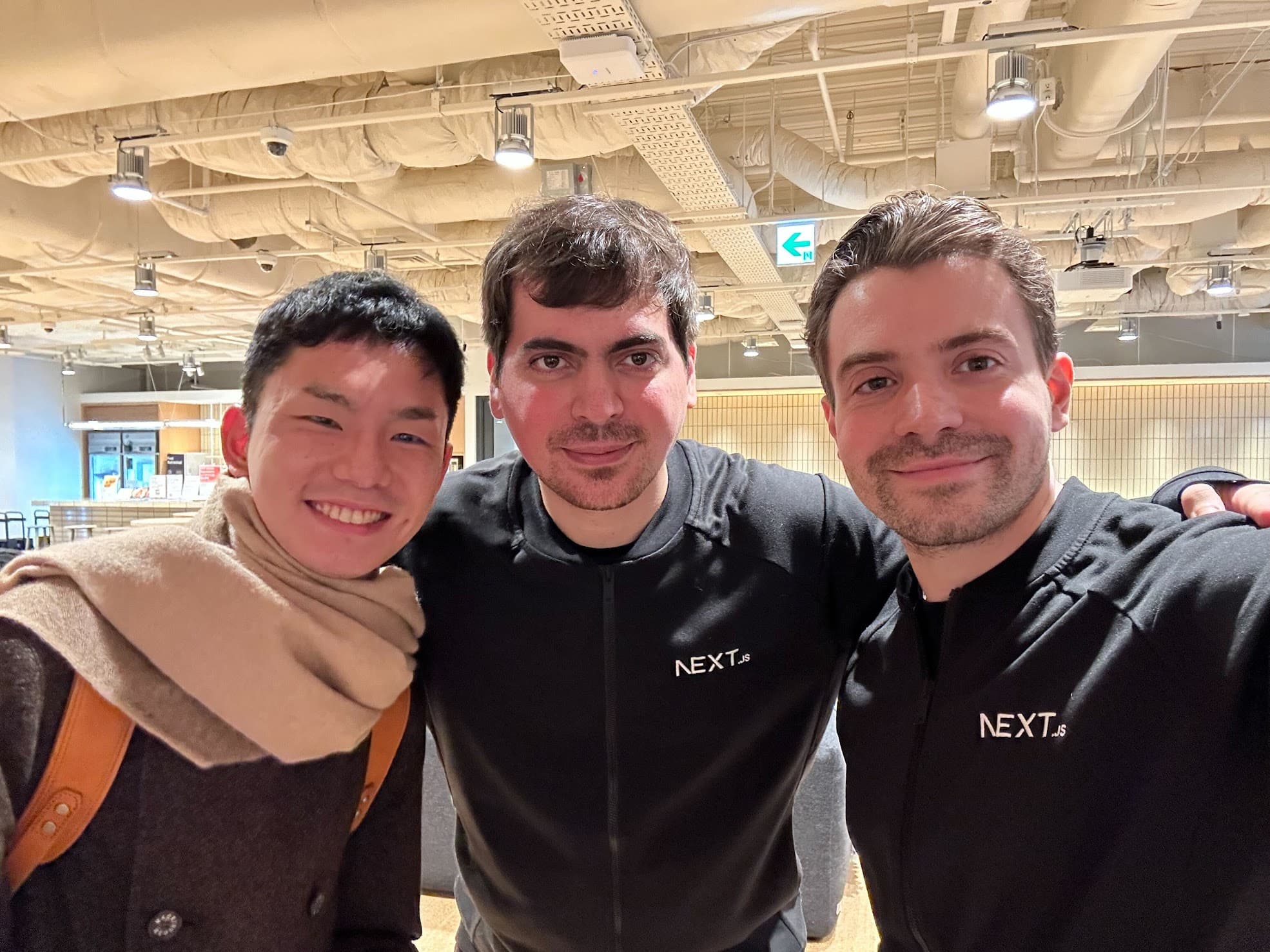 Nicolas with friends at a Next.js event